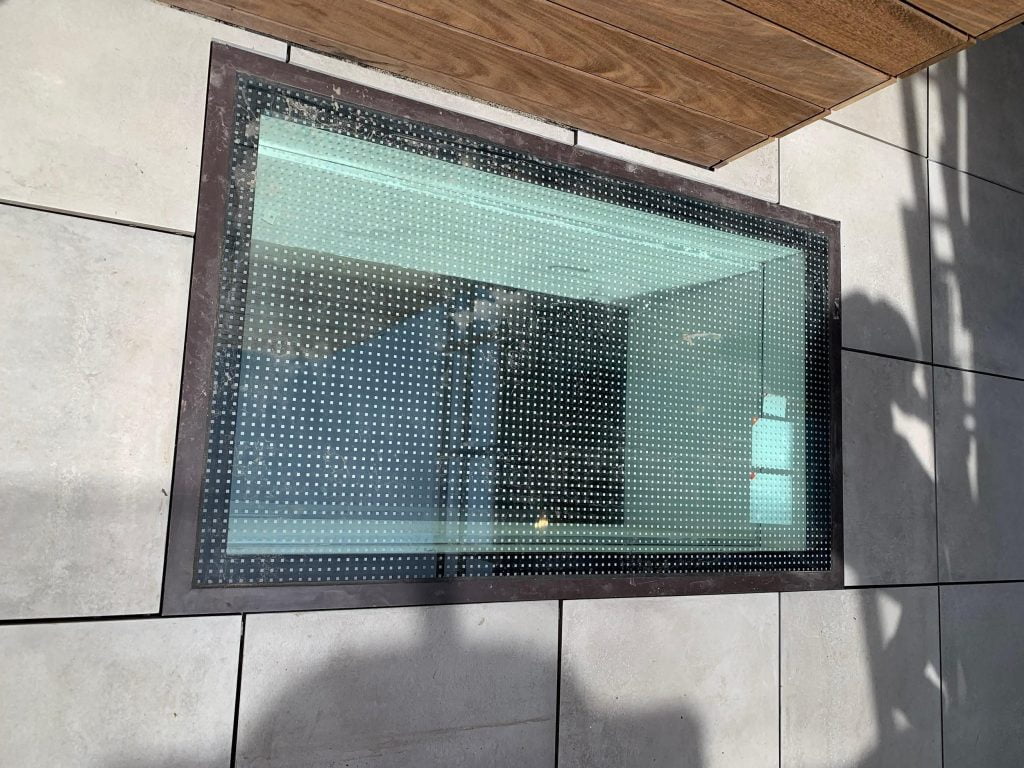 Image of a walkable skylight installed on a rooftop.