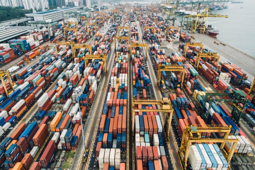 Aerial image of a shipping yard full with shipping containers